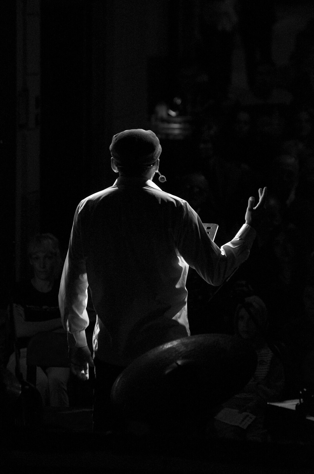 person speaking confidently on stage