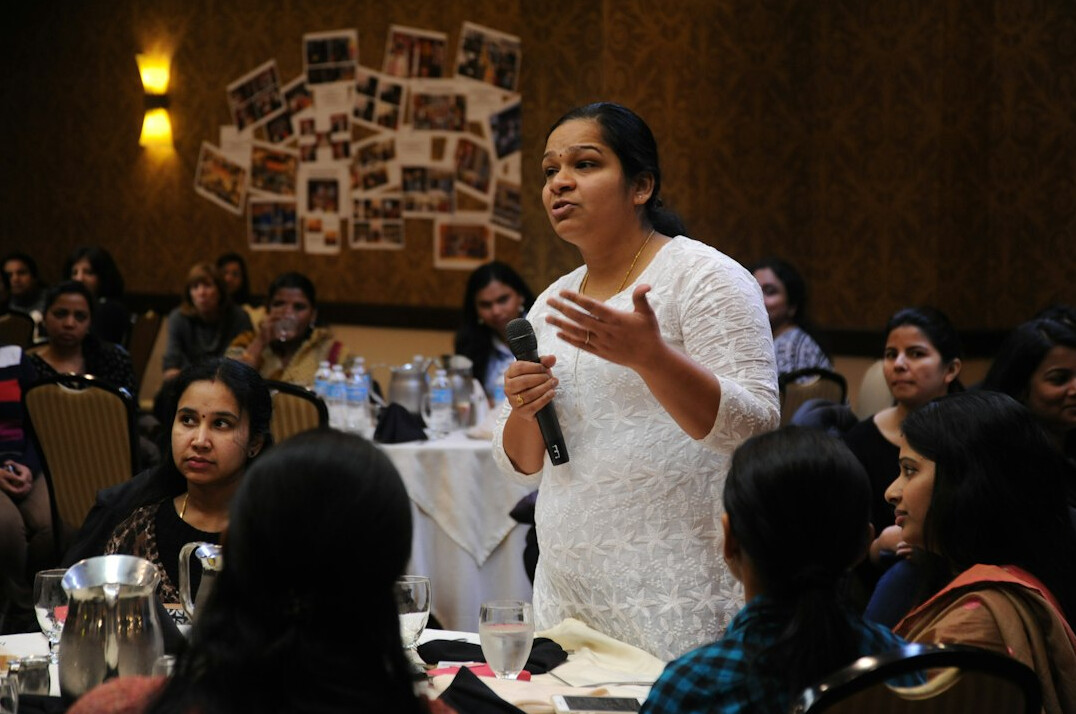 woman presenting to audience