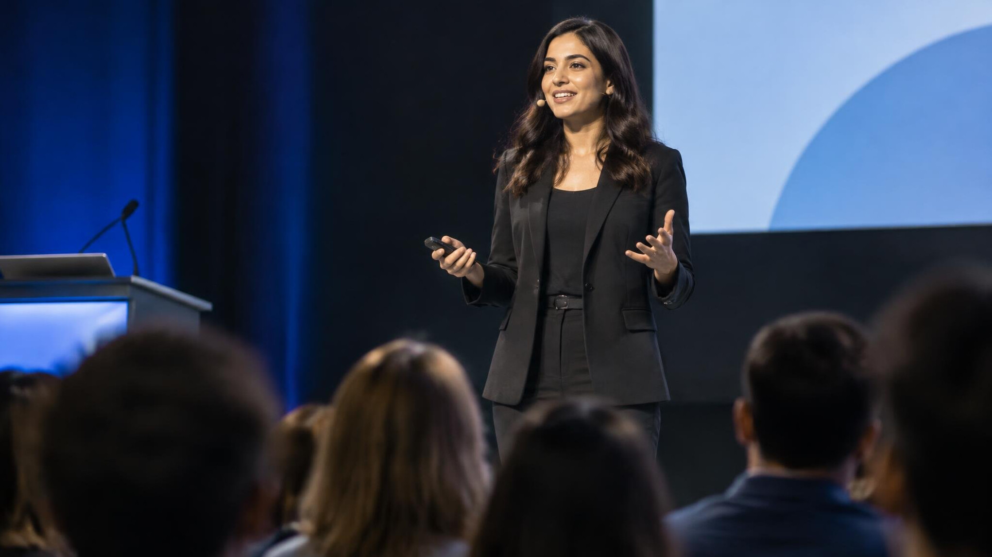 confident speaker on stage