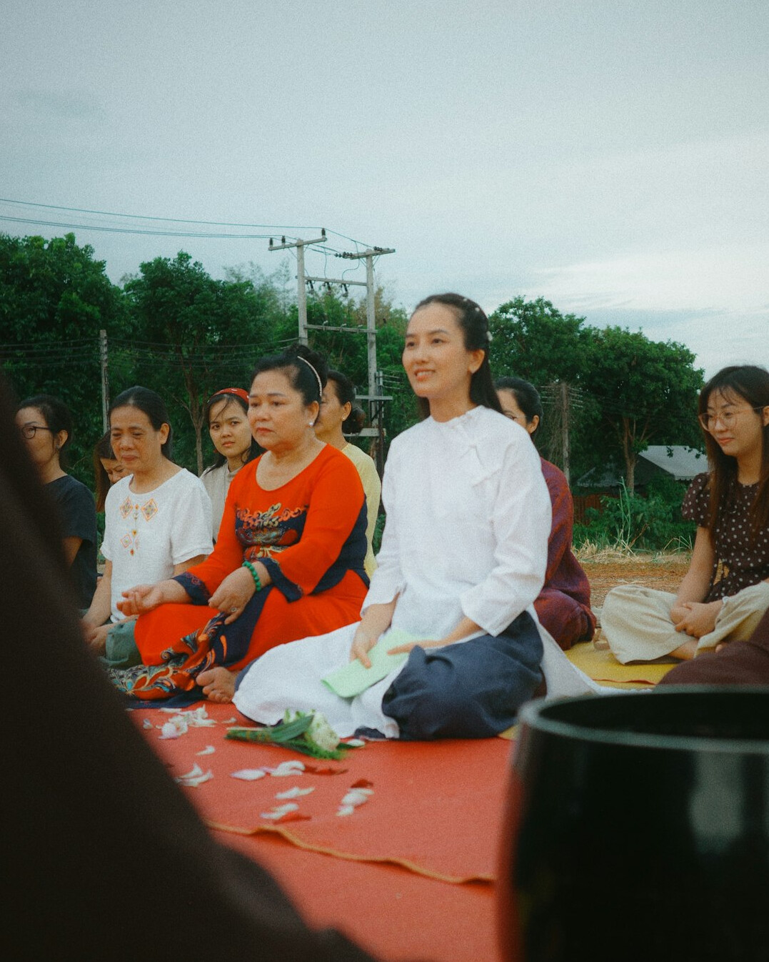 person meditating outdoors